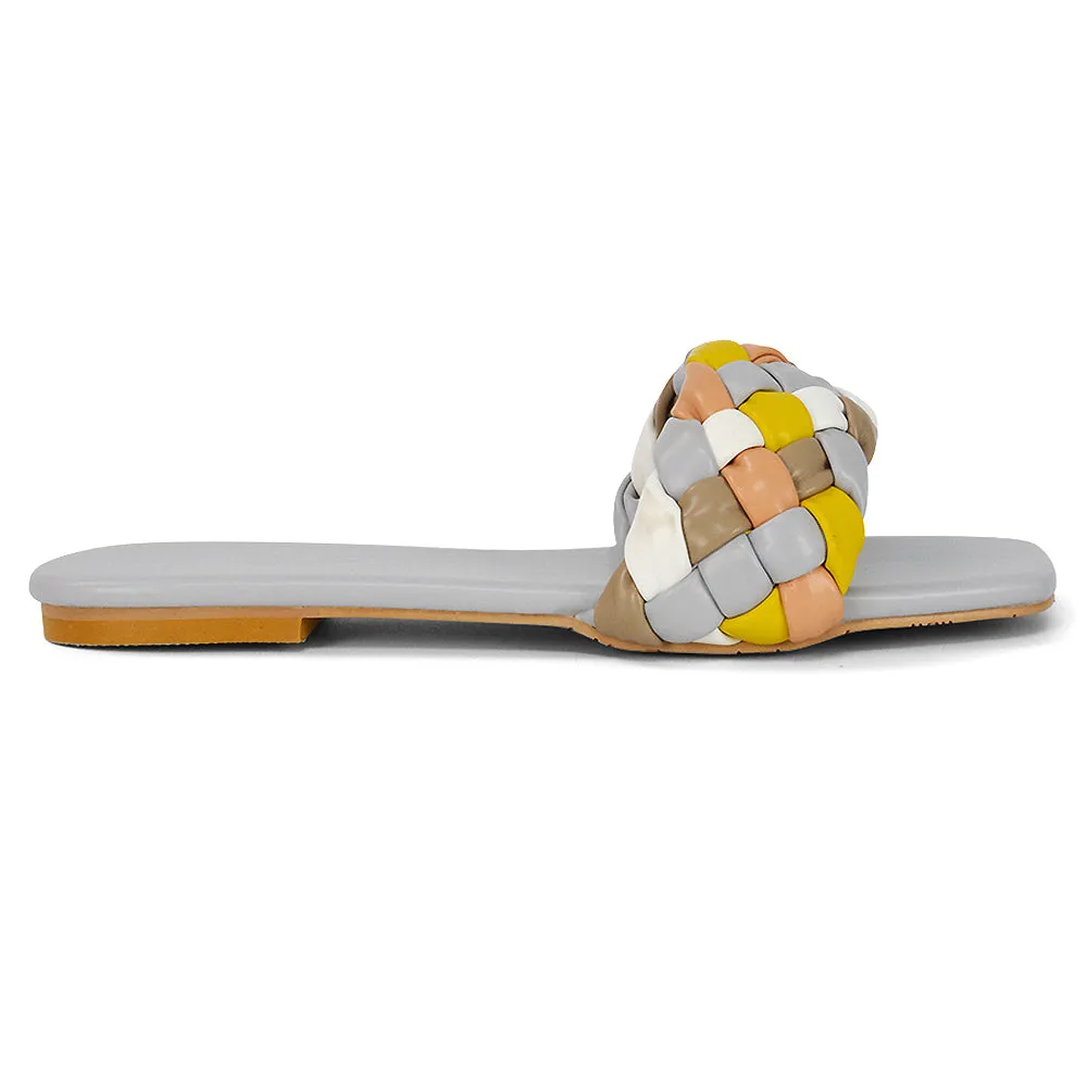 DARCIE WOVEN STRAP SQUARE TOE FLAT SLIDER SANDAL IN BLUE MULTI SYNTHETIC LEATHER